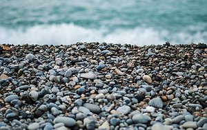 Home. Beach and pebbles 